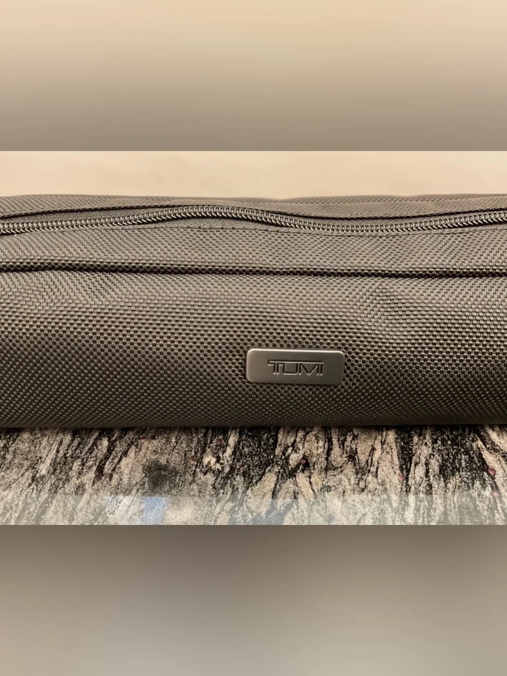 Tumi up sale